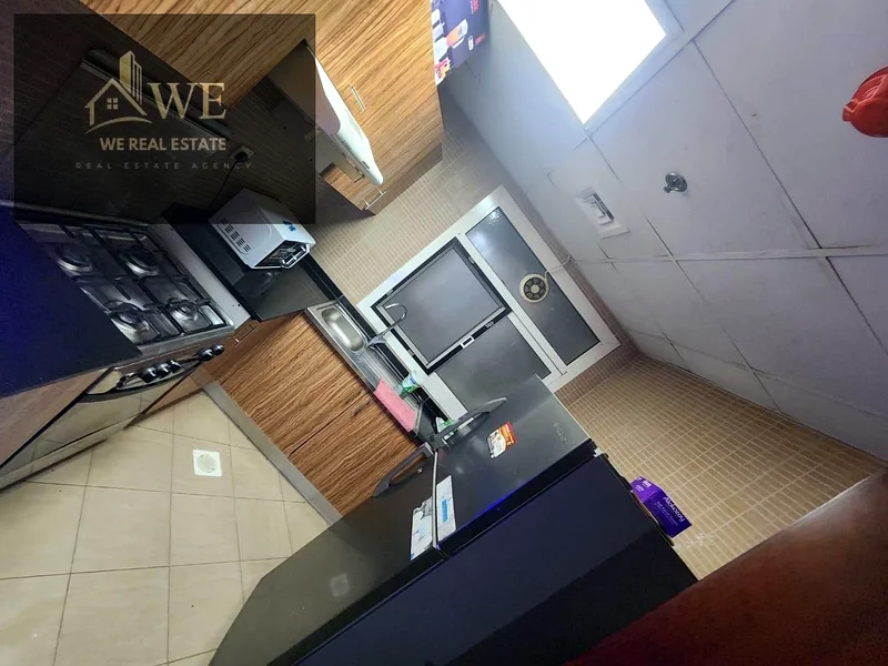 great opportunity to own a spacious 2-bedroom apartment with a parking space in a prime location in Ajman – City Tower, Tower C1. This unit offers a g63890902442625113