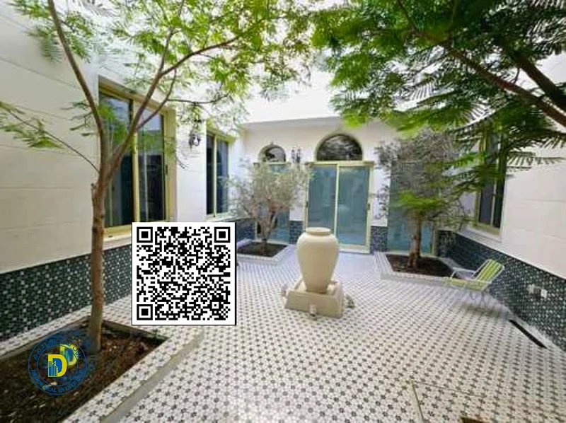 For sale, a Moroccan-style villa, Al Rawda 2, Ajman. The price includes water, electricity, air conditioning, and sewage.63879018682625110