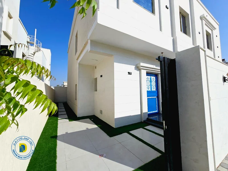 For sale, a Moroccan-style villa, Al Rawda 2, Ajman. The price includes water, electricity, air conditioning, and sewage.63879018682625112