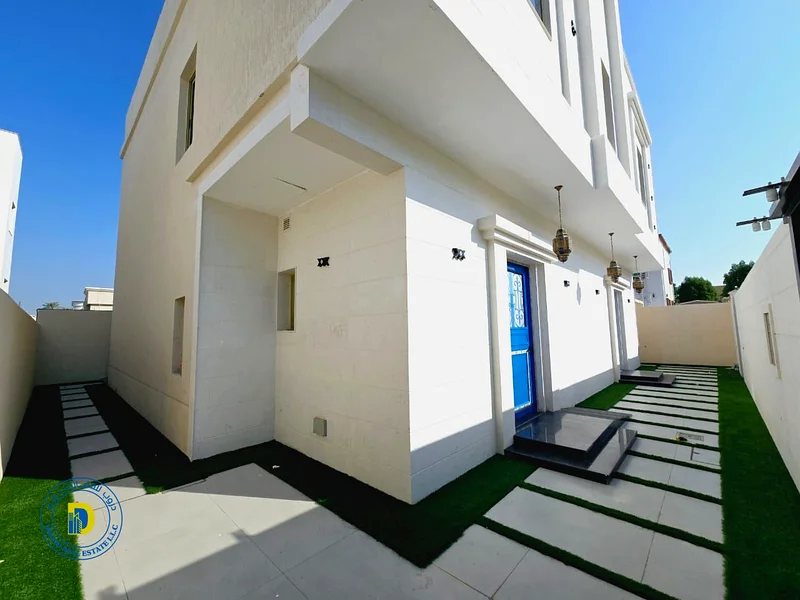 For sale, a Moroccan-style villa, Al Rawda 2, Ajman. The price includes water, electricity, air conditioning, and sewage.63879018682625113