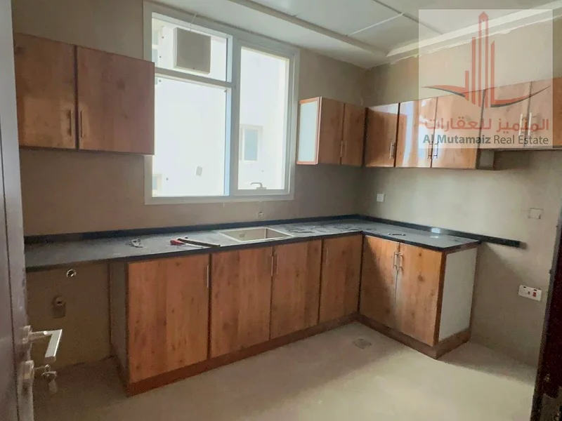 For rent, two rooms and a hall in Al Jurf Industrial 3, a new building63810338067713111