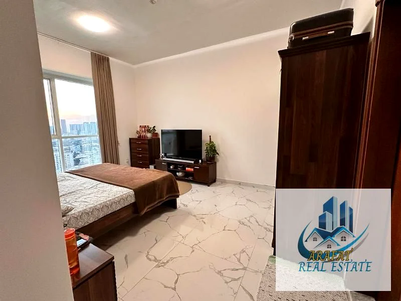 شقة من غرفتي نوم بمساحة 2 غرفة وصالة في برج أويسيس 1 مفروشة بالكامل، دفع فقط 385000/- خطة الدفع63887947337985114