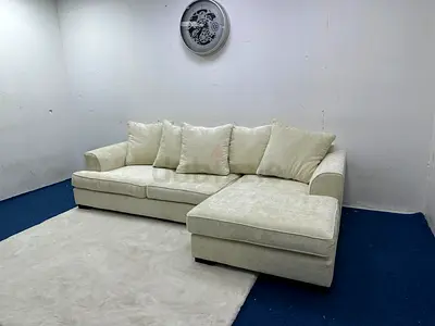 Great condition the one brand Kingston beige color lshape sofa