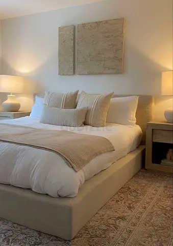 Cozy Elegance: Luxurious Bed Frame with Decorative Accents