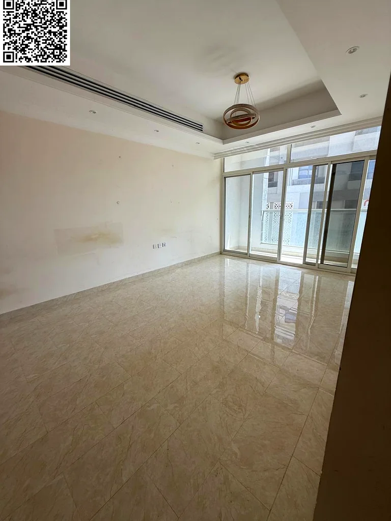 The most beautiful 3 rooms and a hall in Ajman, Al Rawda 2, with 3 bathrooms, a balcony with an open view, free parking, and a free month. A very spec63723653089923113