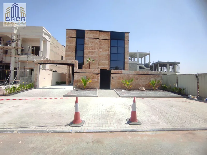 For sale, a luxurious villa in Al Alia - Ajman | Two floors | Modern design | 5 master bedrooms | Majlis + 2 halls63873066949123111