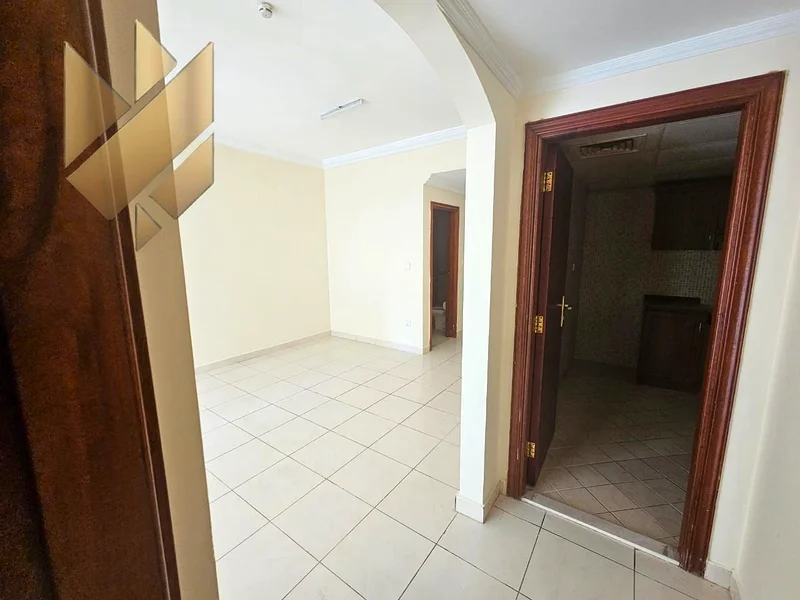 For annual rent, a room and a hall in New Muwailih, with wonderful finishes, excellent spaces and a wonderful view63812707042434114