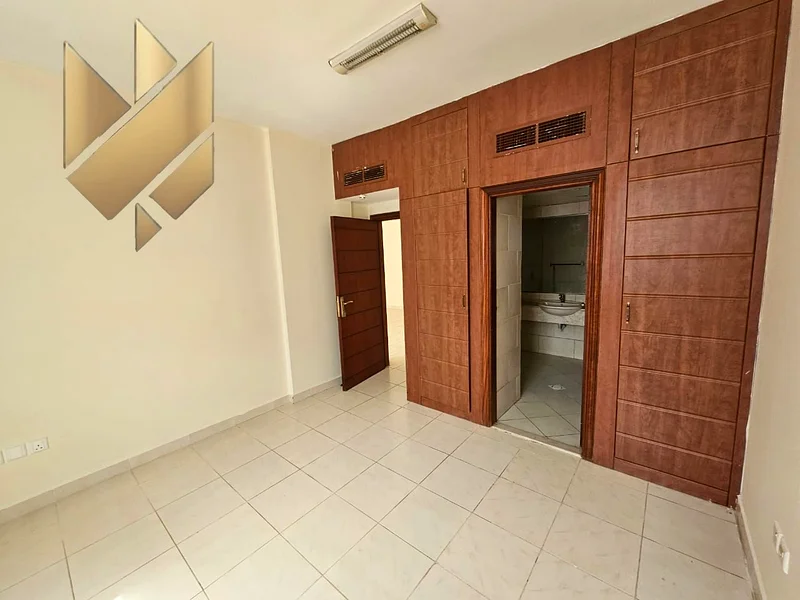 For annual rent, a room and a hall in New Muwailih, with wonderful finishes, excellent spaces and a wonderful view63812707042434113