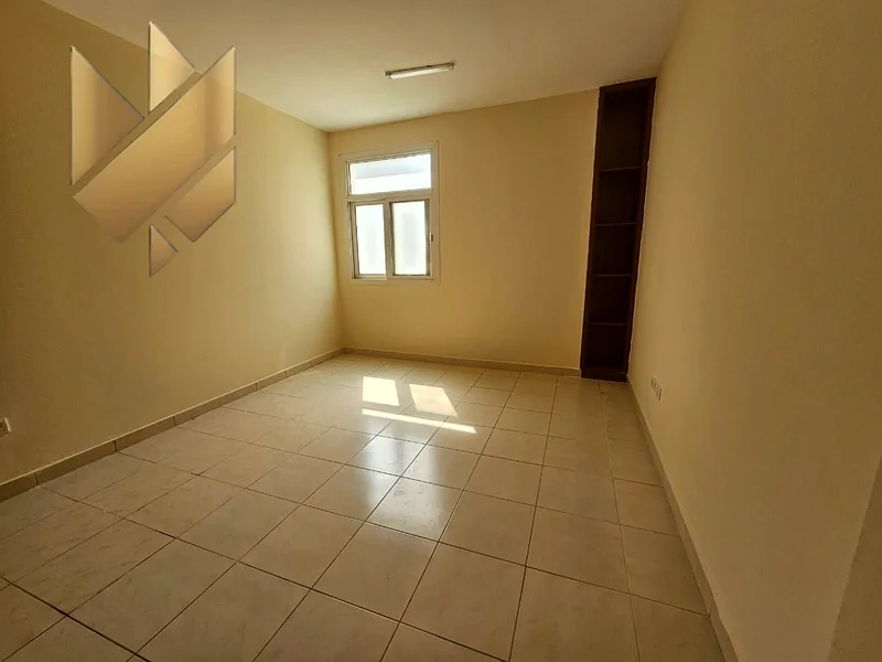 For annual rent, a room and a hall in New Muwailih, with wonderful finishes, excellent spaces and a wonderful view63812707042434111