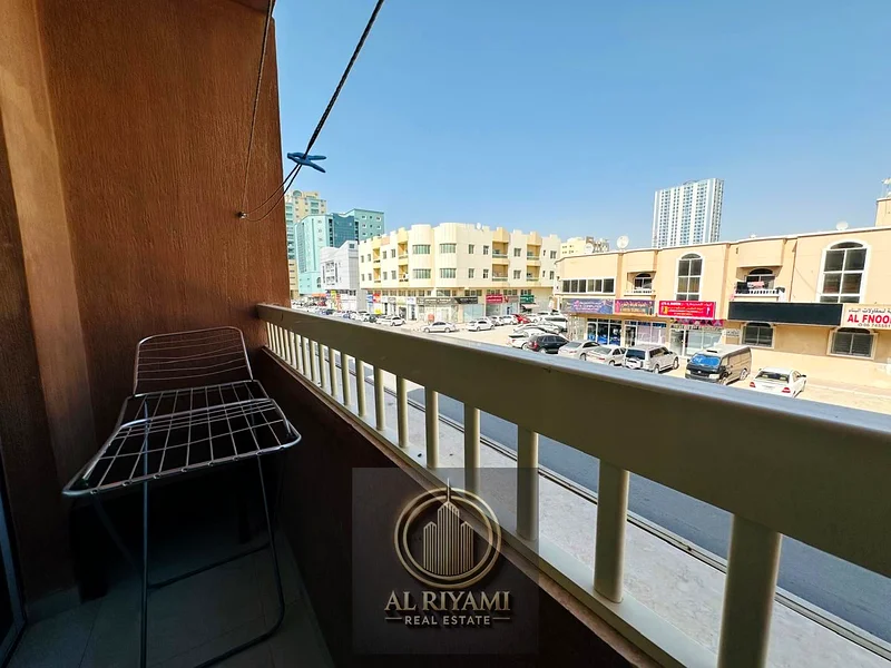 شقة من غرفة نوم واحدة مع شرفة وتكييف مركزي للإيجار – عجمان الروضة 263722819572994113