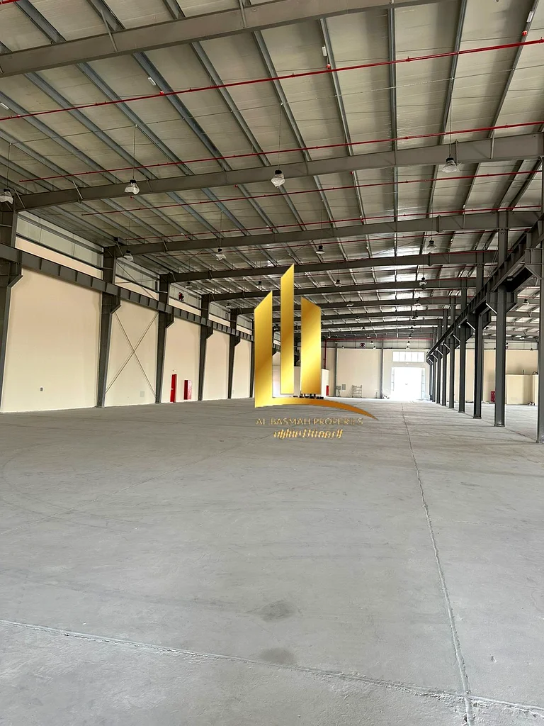 For sale, a large warehouse (corner) in Emirates Industrial City, Block (5), freehold for Arabs.   With an area of ​​45,000 square feet, on a corner o63819416629633114