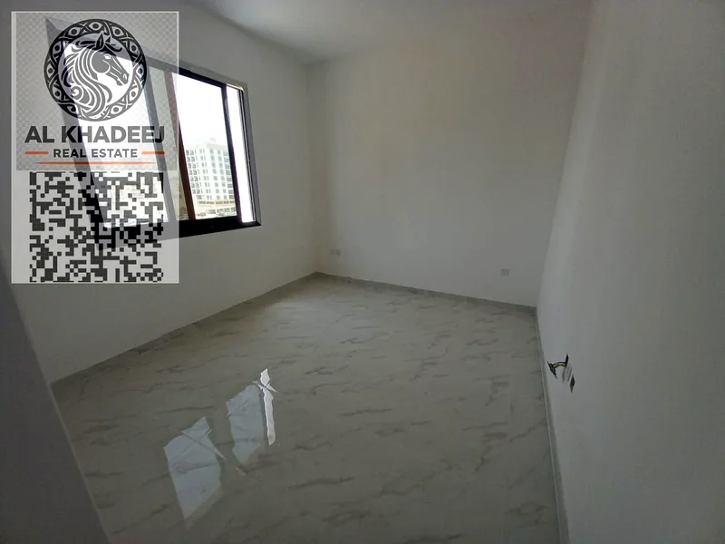 Two rooms and a hall with a large area and a balcony in Al Rawda 1 area, opposite Kanz Mall, easy access to Dubai and Sharjah63722169453571112