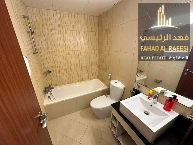 شقة مفروشة بالكامل + موقف خاص + تقسيط مريح في أبراج عجمان وان63867571232129114