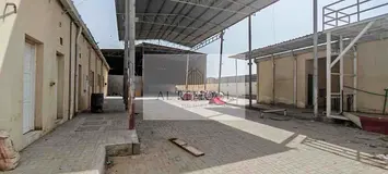 OPEN SHED WITH 8 LABOUR ROOM 2 OFFICE RENT 500K SIZE 20K SQFT IN SAJJA SHARJA
