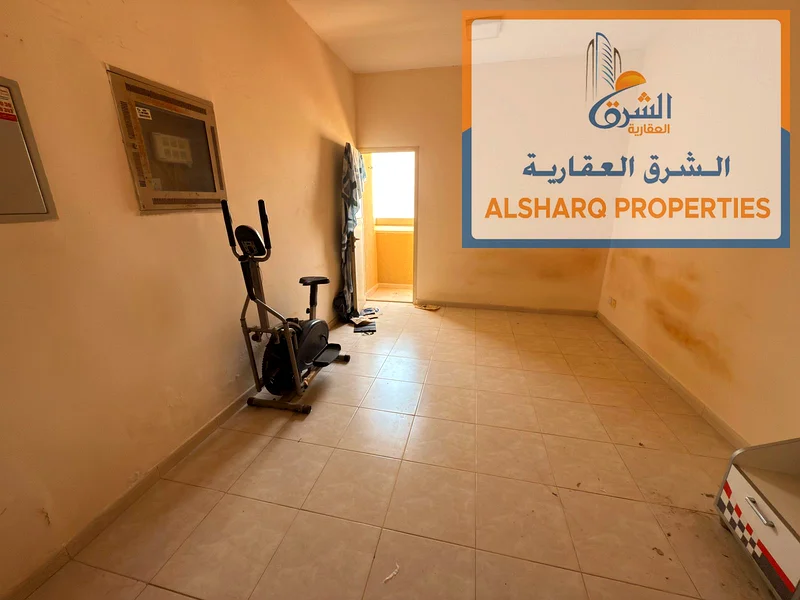 Spacious studio with balcony and open view for annual rent - Al Rawda, Ajman63719426040067111