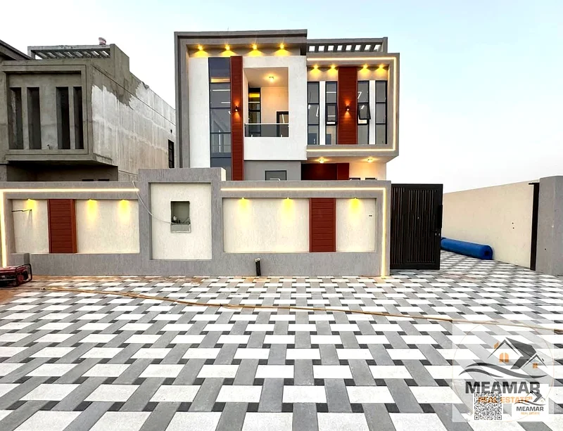 Hurry up and book your villa, ready with the key, including registration fees, freehold, in the most prestigious location in Al Helio, Ajman63907817309827110