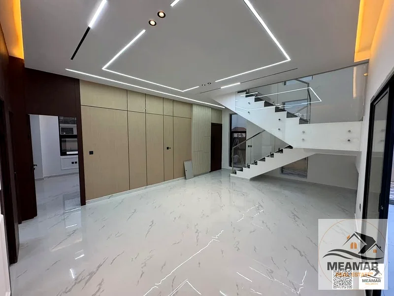 Hurry up and book your villa, ready with the key, including registration fees, freehold, in the most prestigious location in Al Helio, Ajman63907817309827112