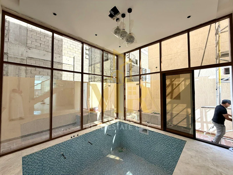 🏡 Luxury villa for sale in Al Bahia - Ajman | Elegant design and overlooking a covered pool63883359815425113