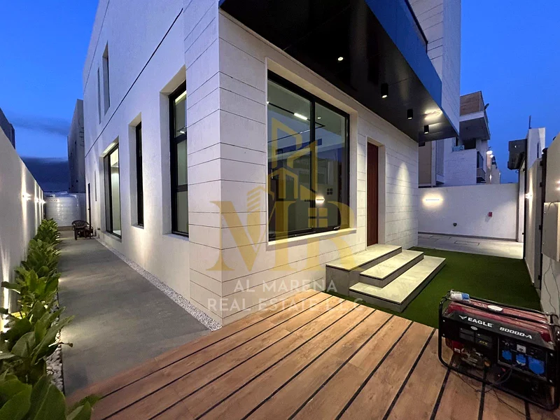 A villa at a price including registration and ownership fees on the main street, ready for occupancy in the most upscale areas of Ajman, freehold for63882680815745112