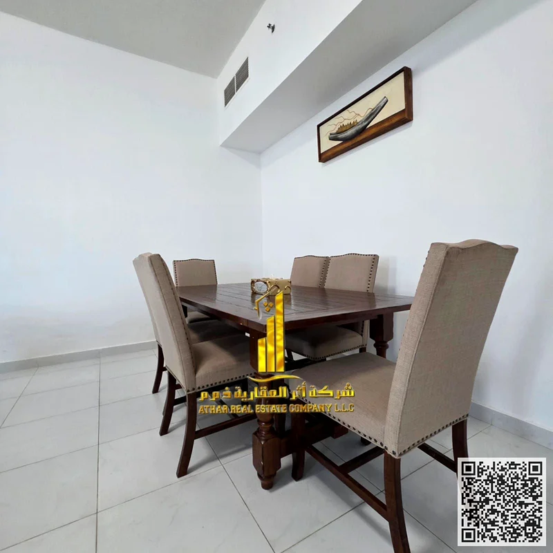 For monthly rent in Ajman - two-bedroom apartment with a balcony, a distinctive open view, fully furnished with elegant furniture, and a fully equippe63838584321667112