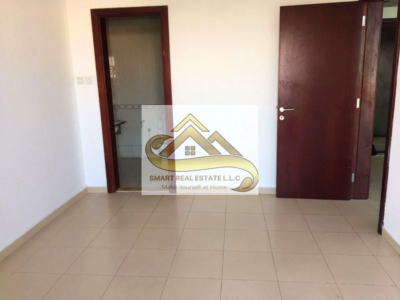 2 bedrooms and a large hall for sale in City Towers Ajman with three bathrooms and a large separate kitchen and balcony with beautiful view63891129268097113