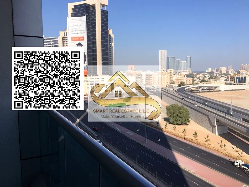 2 bedrooms and a large hall for sale in City Towers Ajman with three bathrooms and a large separate kitchen and balcony with beautiful view63891129268097110