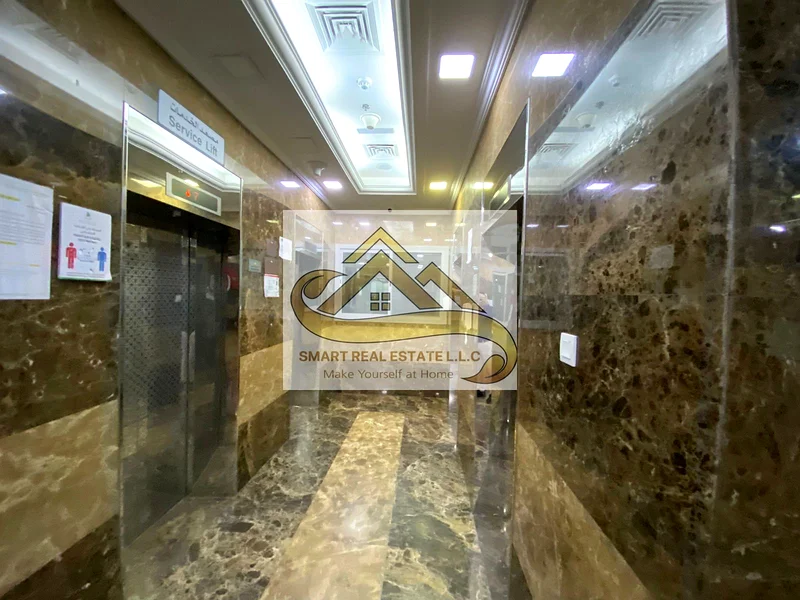 2 bedrooms and a large hall for sale in City Towers Ajman with three bathrooms and a large separate kitchen and balcony with beautiful view63891129268097112