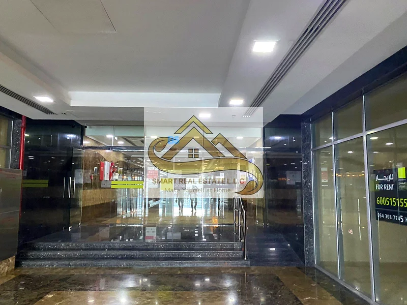 2 bedrooms and a large hall for sale in City Towers Ajman with three bathrooms and a large separate kitchen and balcony with beautiful view63891129268097111