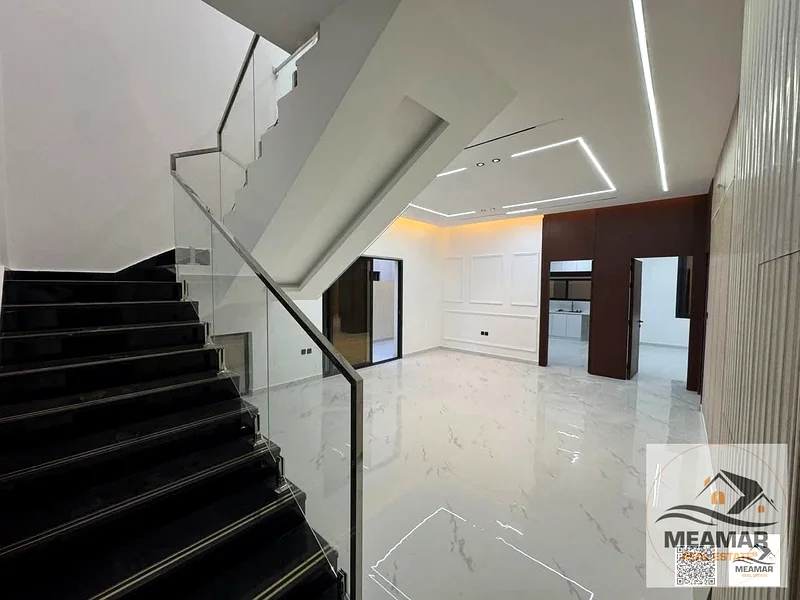 Hurry up and book your villa, ready with the key, including registration fees, freehold, in the most prestigious location in Al Helio, Ajman63907817309827114