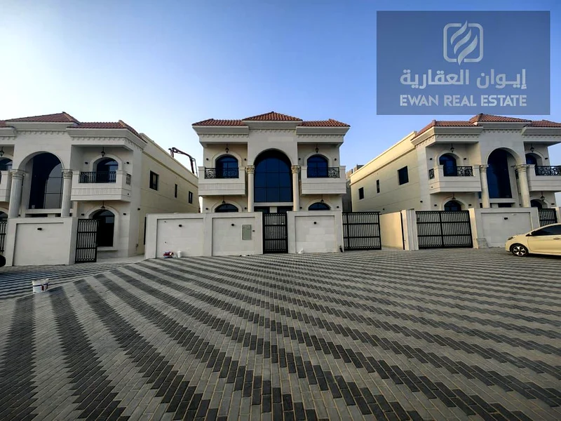 For Sale | Luxurious corner villa in Al Helio, Ajman, super deluxe finishing + private pool, prime location: - Near the exits from Sharjah and Dubai .63909116861443111