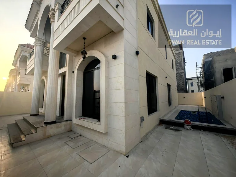 For Sale | Luxurious corner villa in Al Helio, Ajman, super deluxe finishing + private pool, prime location: - Near the exits from Sharjah and Dubai .63909116861443112
