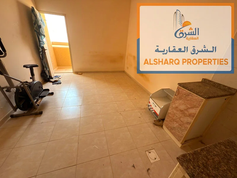 Spacious studio with balcony and open view for annual rent - Al Rawda, Ajman63719426040067114