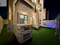 Luxury villa with 5 master bedrooms, a living room, 2 halls, and a roof in Al-Amerah - close to serv