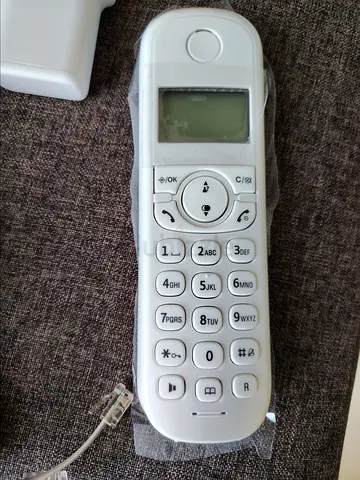 New Wireless Landline Telephone - Clear Calls Anytime!White elegance. 100 dhs!!