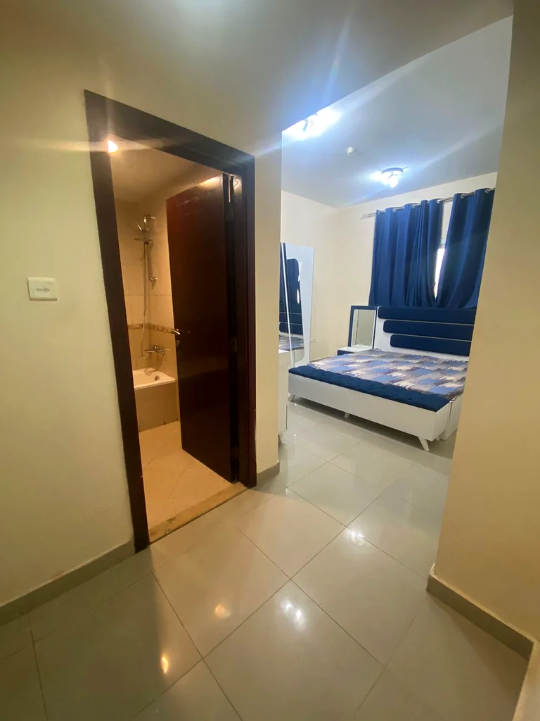 Two rooms,a hall,balcony,3bathroom,med room ,furnished with hotel furniture,6,199 dirhams with internet, Burj Manazel 263827987909761112