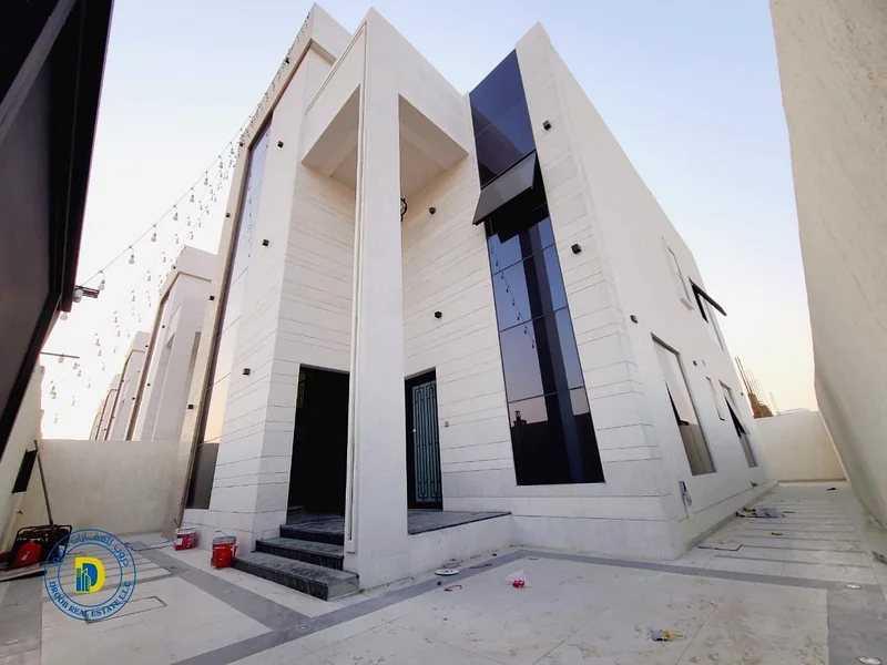 For sale, a modern villa with 5 rooms and a roof, including registration fees, in Al Helio 2, super deluxe finishing, freehold , bank financing63909885833731111