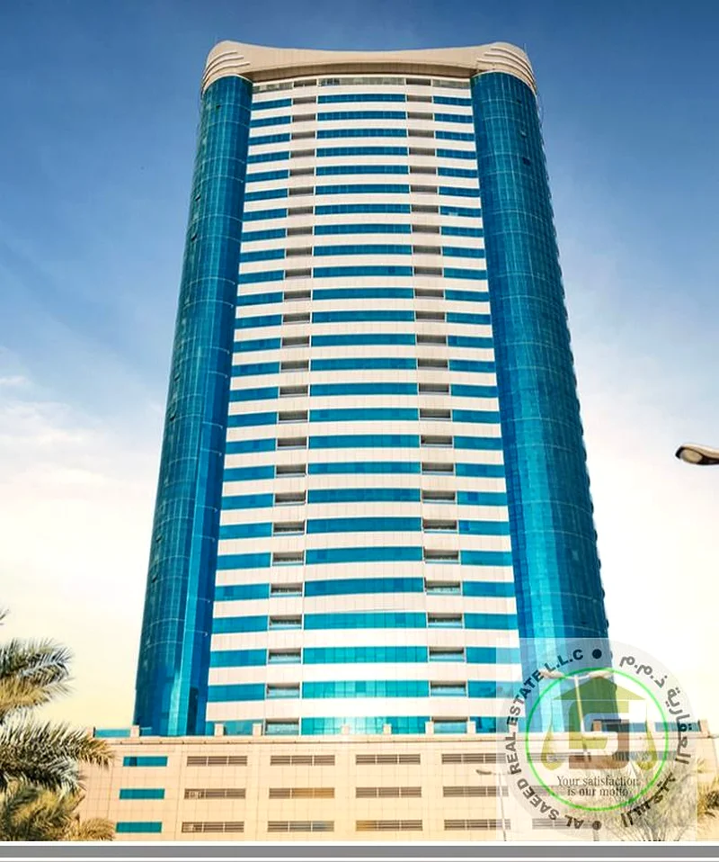 شقة مكونة من غرفتين نوم متاحة للإيجار في برج مع تكييف مركزي مجاني63708053504513110