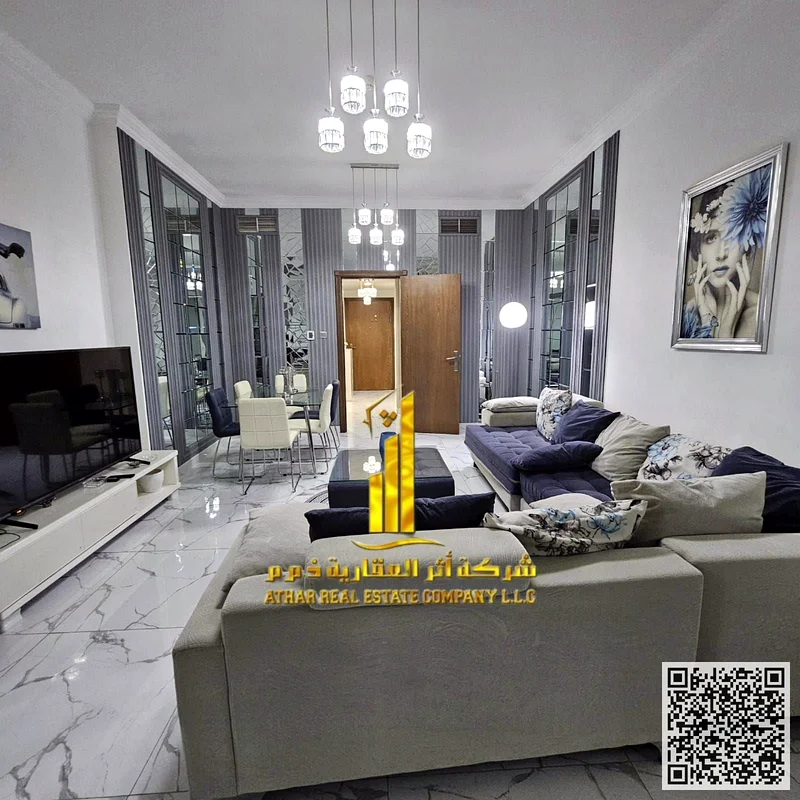Luxury two-bedroom apartment with a hall and a maid's room, fully furnished, for monthly rent in Ajman - Al Rashidiya 1 - Oasis Towers63852579258498112