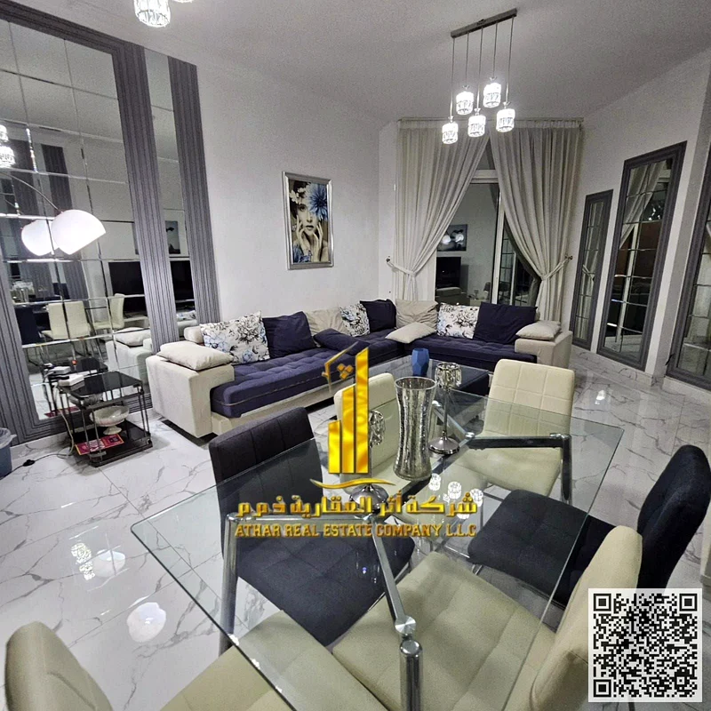 Luxury two-bedroom apartment with a hall and a maid's room, fully furnished, for monthly rent in Ajman - Al Rashidiya 1 - Oasis Towers63852579258498110