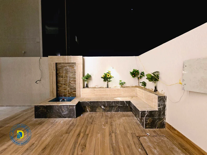 For sale, a modern villa with 5 rooms, including registration fees, in the Al Helio area, Ajman, super deluxe finishing, freehold , bank financing63892581442946112