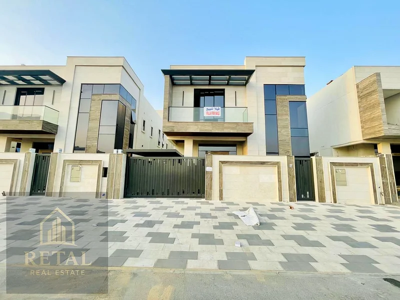 Luxury villa for sale in Ajman, Al Bahia area – 5 master bedrooms, majlis, living room, fitted kitchen, maid’s room, central AC, super deluxe finish63882823548035110
