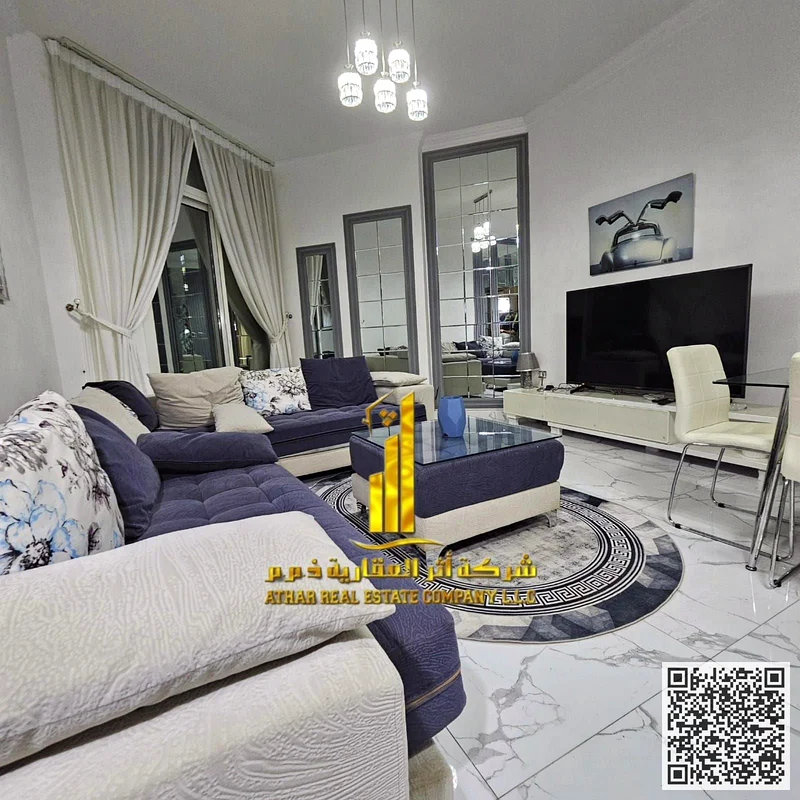 Luxury two-bedroom apartment with a hall and a maid's room, fully furnished, for monthly rent in Ajman - Al Rashidiya 1 - Oasis Towers63852579258498114