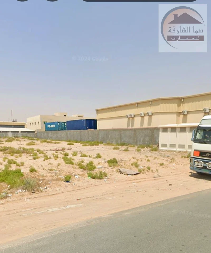 For sale land in Emirates Industrial City, Al Hanou, Block 7, industrial permit, fences, warehouses, workers’ housing, a very distinguished location c63818610218498114