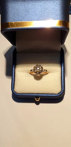 14K REAL  GOLD AND 9 DIAMOND RING  ... WEIGHT 3.2 gr - 9 DIAMONDS TOTAL WEIGHT-0.8 CARAT, RING SIZE-