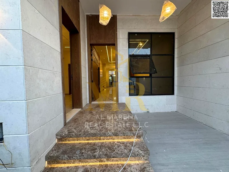 A ready-to-move-in villa on the main street in the most upscale areas of Ajman, two floors and a roof, at a price including registration and ownership63909770243330112
