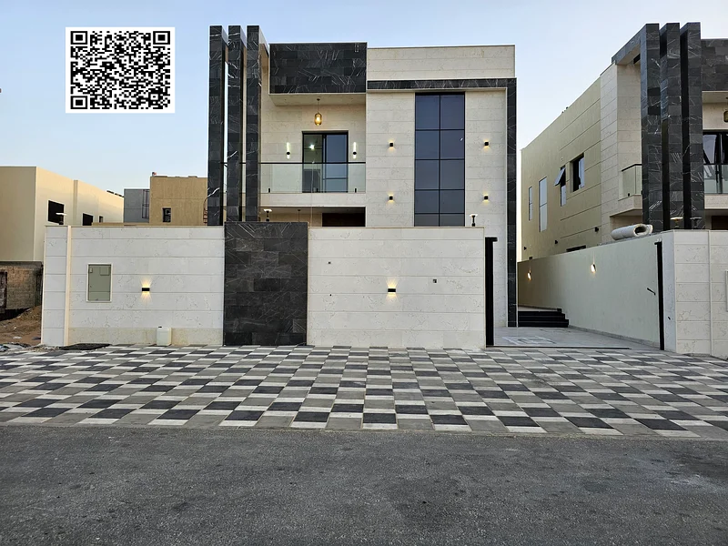 Villa for sale in Ajman, Al Helio 2 area, including registration and ownership fees, consisting of 4 master bedrooms with a swimming pool, freehold fo63909552278145110