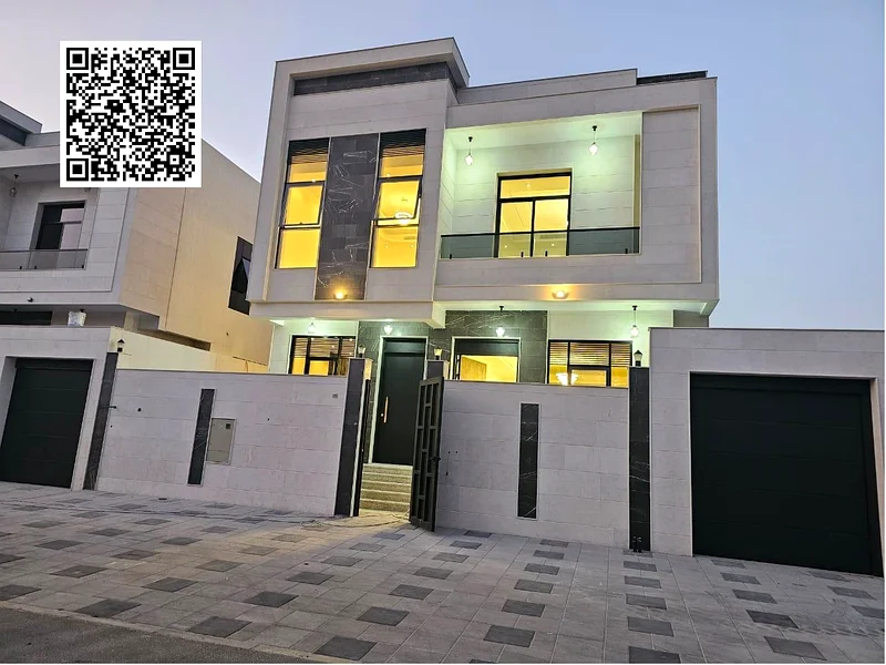 Villa for sale in Ajman, Al Bahia area, including central air conditioning, consisting of 5 master bedrooms, a living room, a hall, and indoor and out63883087795457110