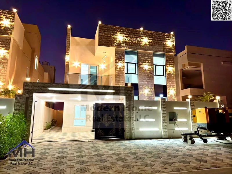 At a price including fees and installation central AC, own a villa in Ajman, first resident, freehold, sound system cameras, opposite Al Hamidiya Park63909334037378111