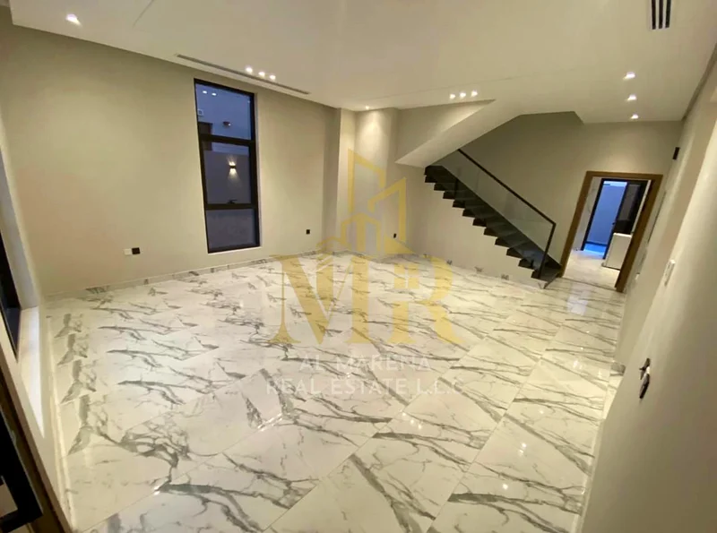 🏡 للبيع: فيلا فاخرة في الباهية – عجمان | طابقين + سطح كبير | 6 غرف نوم رئيسية | مجلس + غرفة معيشة مع أحواض غسيل | مطبخ حديث |63883480372993112