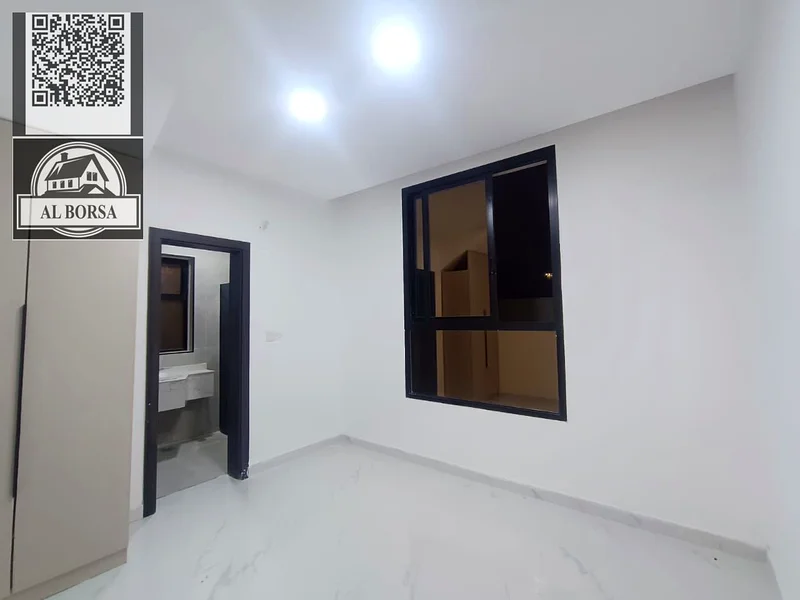 Corner villa for sale in Al Helio 2, Ajman, 4 bedrooms, a majlis, a hall, a kitchen, a spacious are63911619923331114